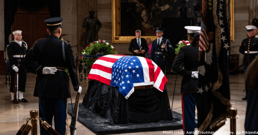 Trump shakes hands with Pence, chats with Obama at Carter funeral