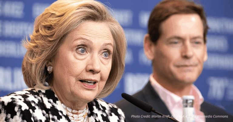 Hillary Clinton at a red carpet event in 2020, facing forward with serious expression