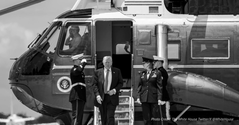 President Trump exits Marine One flanked by military officers after landmark EU trade agreement