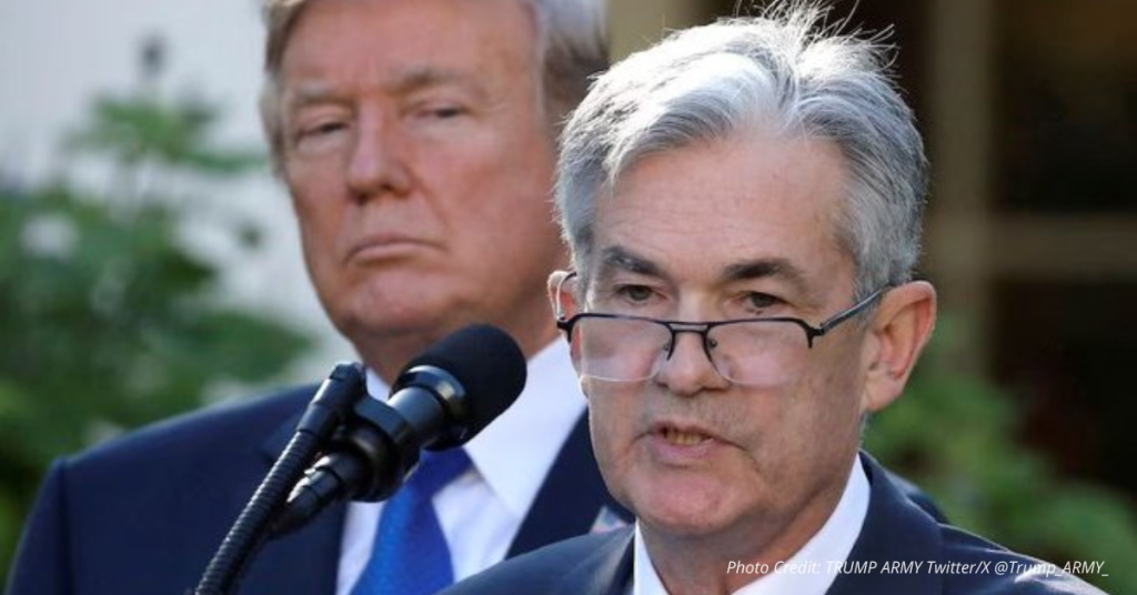 Trump stands behind Powell at a press podium as viral tweet calls for Powell’s removal as Fed Chair