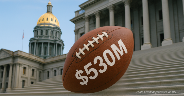 Football labeled $530M rolling down Capitol steps to show a punt