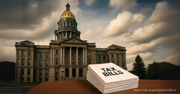 Colorado Capitol with stack of tax bills in foreground