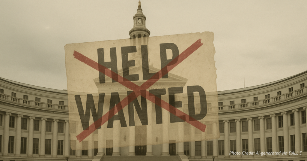 Denver City Hall with crossed-out Help Wanted sign showing layoffs