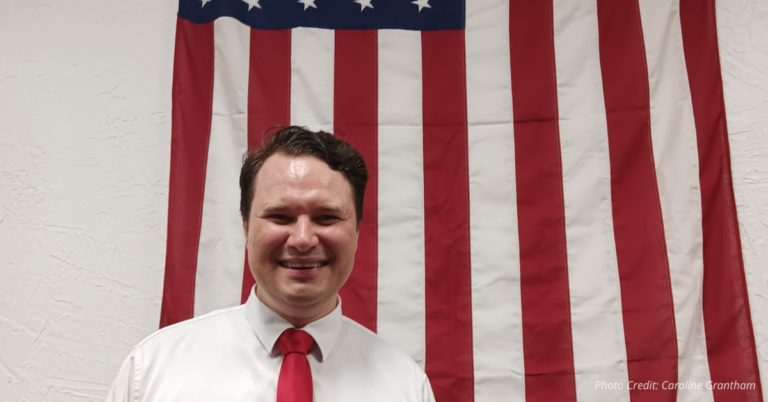Gregory Carlson announces Fremont County commissioner candidacy in front of American flag