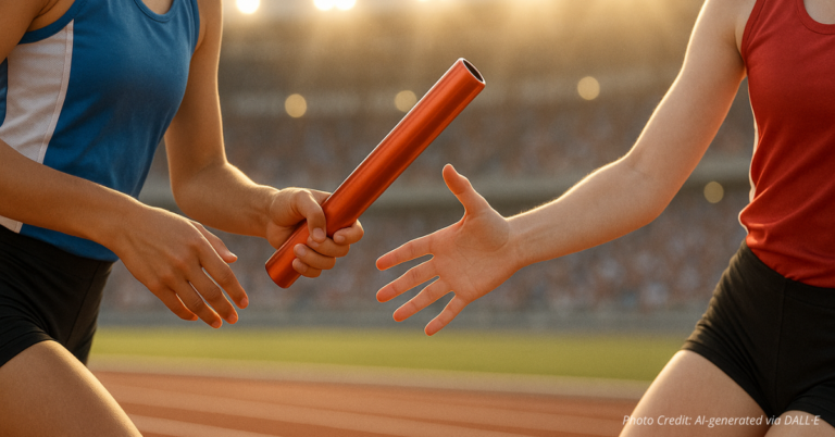 Girls’ track baton handoff symbolizing fairness in sports