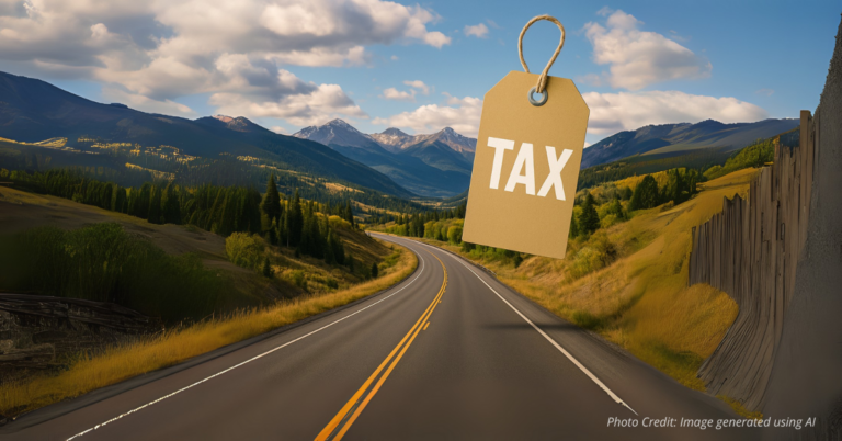 Colorado highway with price tag over mountains