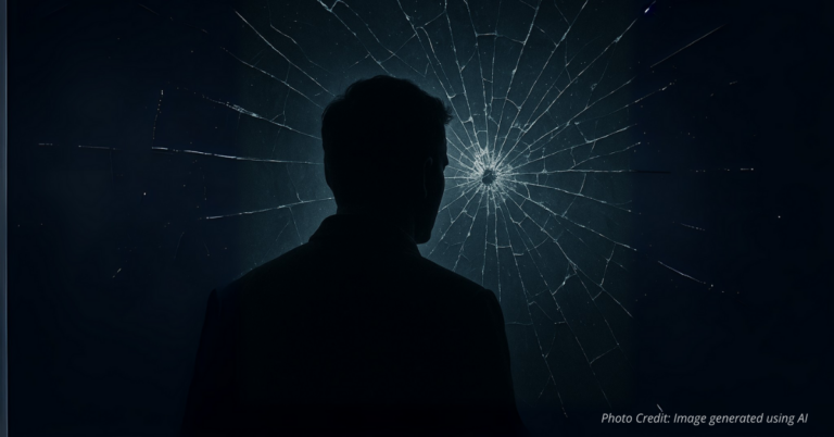 Silhouette behind shattered glass representing broken trust and violence