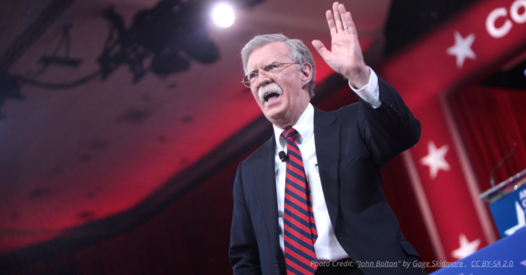 Former National Security Adviser John Bolton surrenders to authorities.