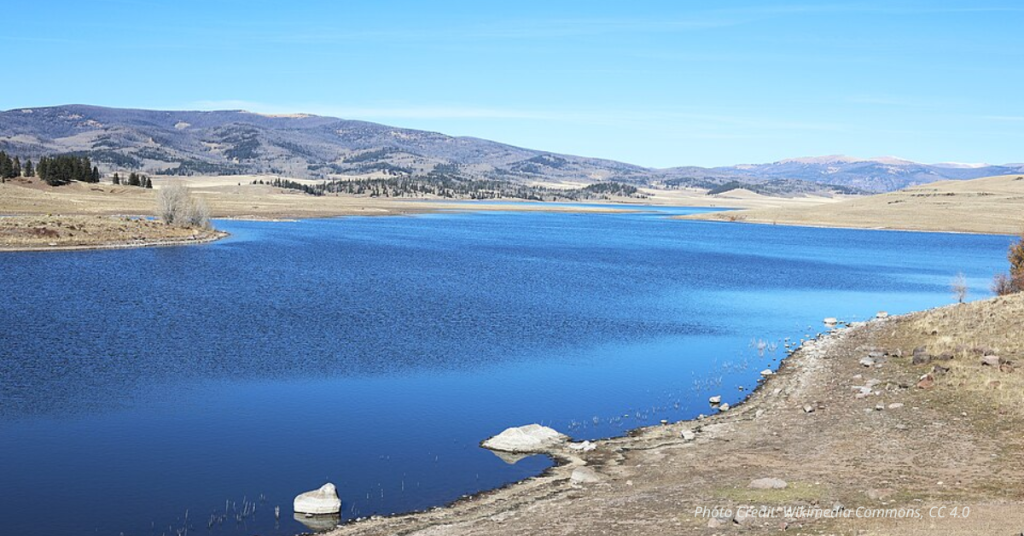 View of La Jara Reservoir on a sunny day.