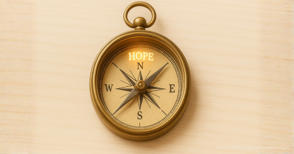 Compass needle pointing toward hope symbolizing direction in mental health support