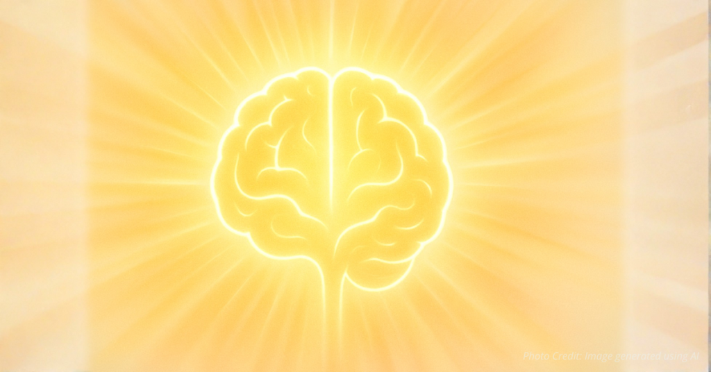 Glowing brain outline made of light symbolizing clarity and renewed thinking