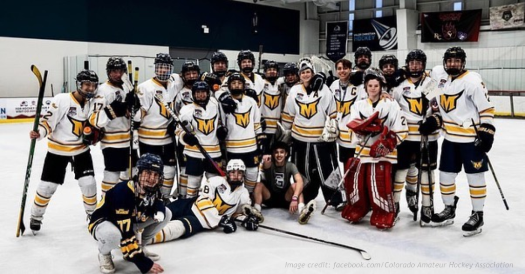 Colorado Amateur Hockey Association players on ice.