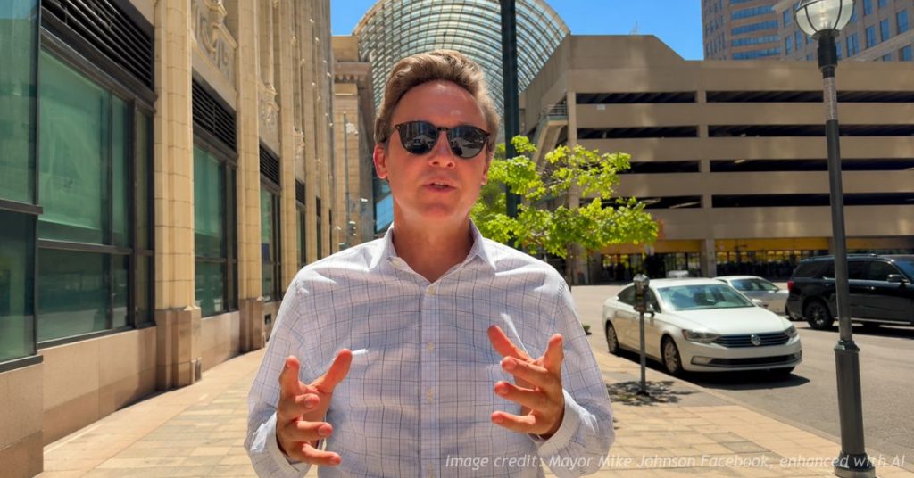 Denver Mayor Mike Johnston speaks in downtown Denver as he prepares to seek reelection in 2027.