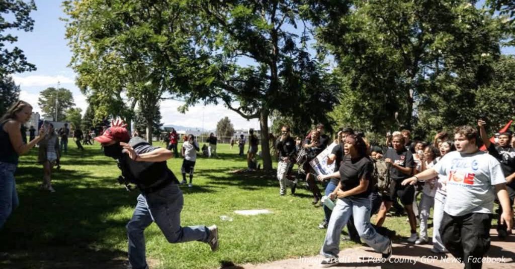 Crowd runs through La Alma-Lincoln Park during confrontations at a Denver anti-ICE student walkout.