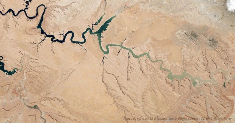 Landsat satellite view of Lake Powell at 42 percent capacity in 2014, its low water snaking through red desert canyons.