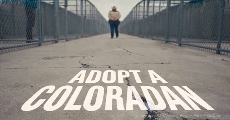 Wyoming Border Patrol video screenshot showing “Adopt a Coloradan” on pavement as a cowboy walks away.