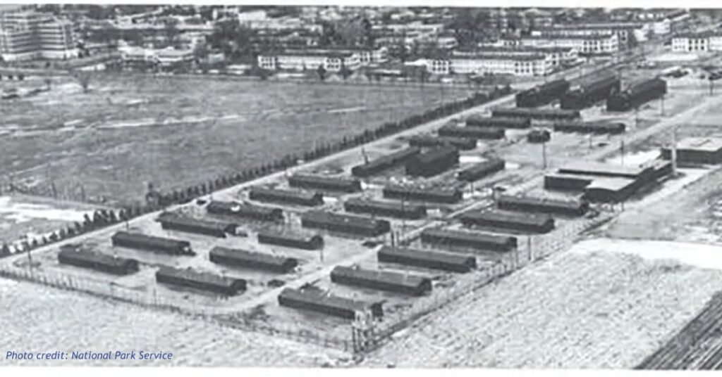 Historic aerial photograph of Fitzsimons Army Hospital in Aurora, Colorado, showing rows of military hospital buildings and surrounding grounds.