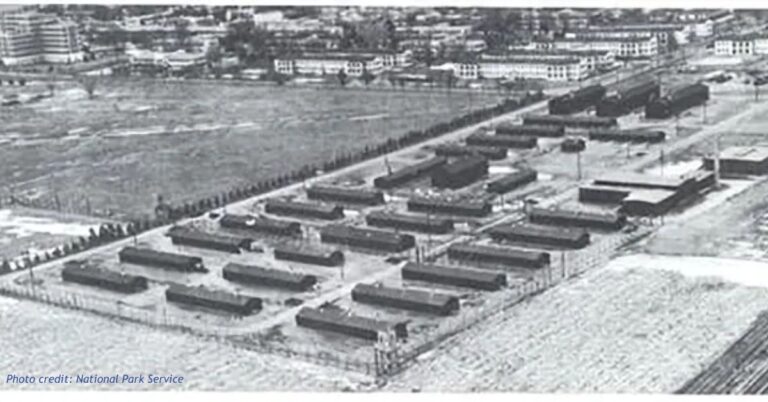 Historic aerial photograph of Fitzsimons Army Hospital in Aurora, Colorado, showing rows of military hospital buildings and surrounding grounds.